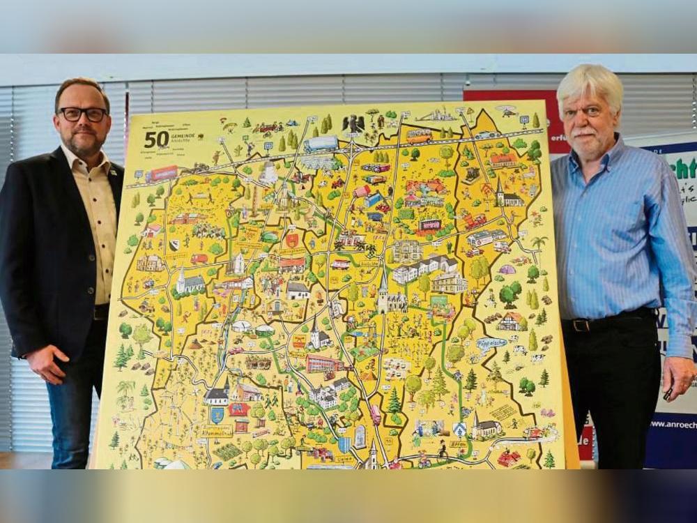 Bürgermeister Alfred Schmidt und Illustrator Gerd Korge mit dem Anröchter Wimmelbild.