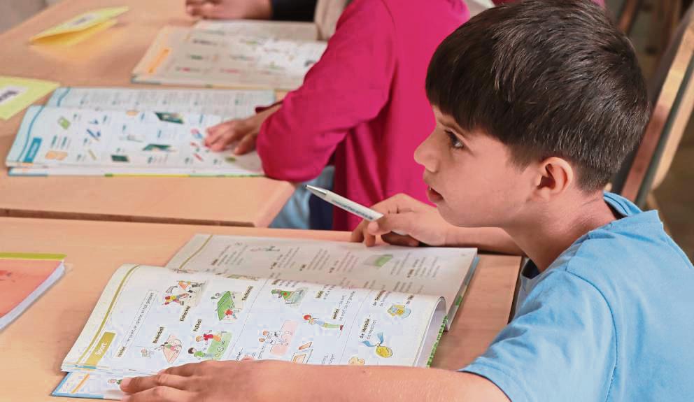 Zu den Angeboten der Erwitter Flüchtlingshilfe zählt unter anderem die Sommerschule, bei der Kinder von Migranten Nachhilfe – und zwar nicht nur in Deutsch – bekommen. Archivfoto: Ulrike Dietz