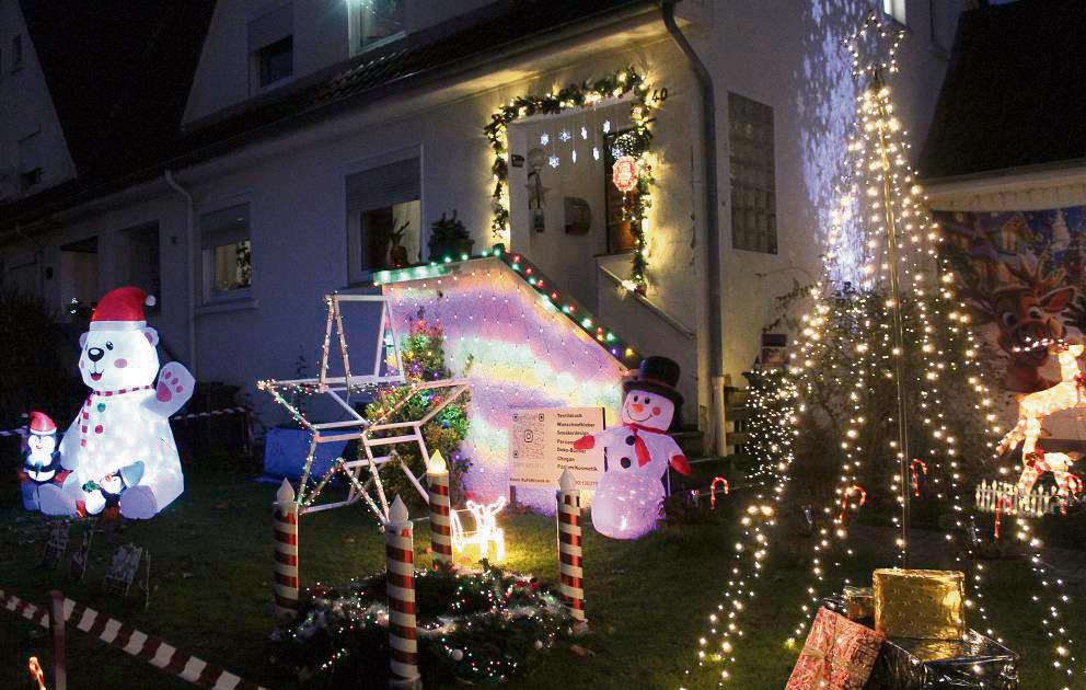 Der Vorgarten an der Ebertstraße verwandelt sich zu dieser Zeit in ein bunt leuchtendes Winter Wonderland – die erste Kerze des Adventskranz brennt auch schon. Foto: Soraya Dietz