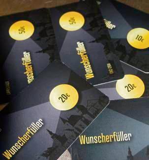 Ein Stück Heimat: Der Wunscherfüller, digitalisiert oder wie hier im Scheckkartenformat, ist in ca. 90 Geschäften einlösbar. Foto: Schwade