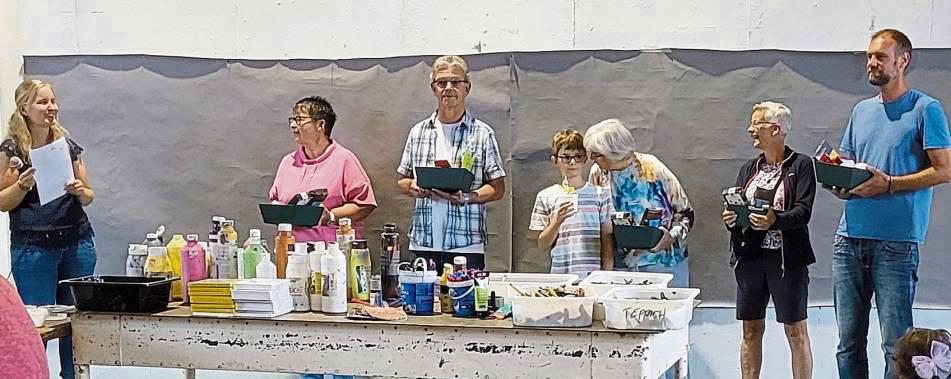 Die Koordinatorinnen des SKM-Patenprojekts nutzten das Sommerfest, um die Patinnen und Paten zu ehren, die ihr Amt bereits seit fünf oder seit zehn Jahren ausüben.