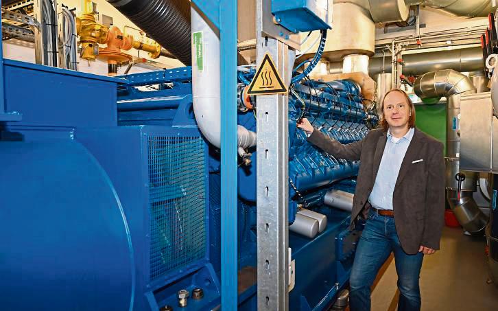 Gewartet und aufgerüstet: Das Eickelborner Blockheizkraftwerk ist fit für weitere Betriebsstunden, sagt Stadtwerke-Projektplaner Jürgen Brunstein.