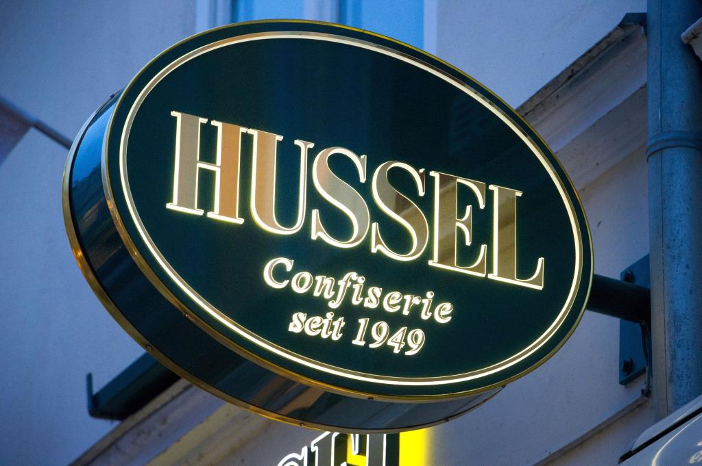 Das Logo der Confiserie «Hussel». - Foto: Stefan Sauer/dpa-Zentralbild/dpa