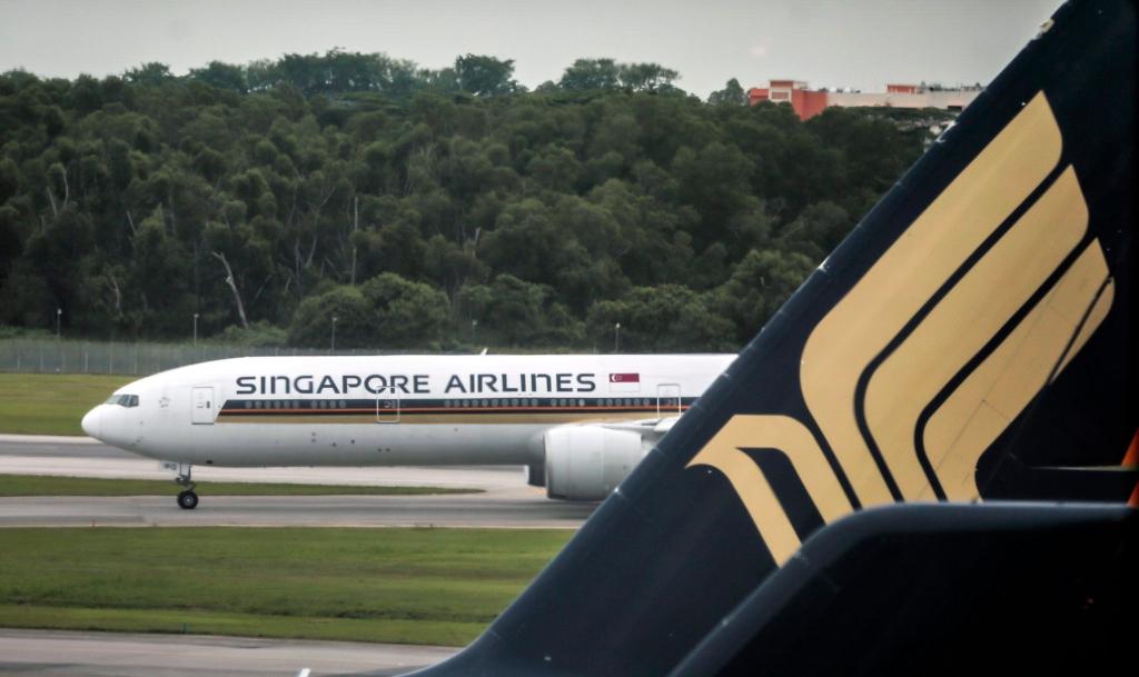 Eine Boeing 777 von Singapore Airlines auf dem Flughafen von Singapur (Archivbild). - Foto: Wallace Woon/dpa
