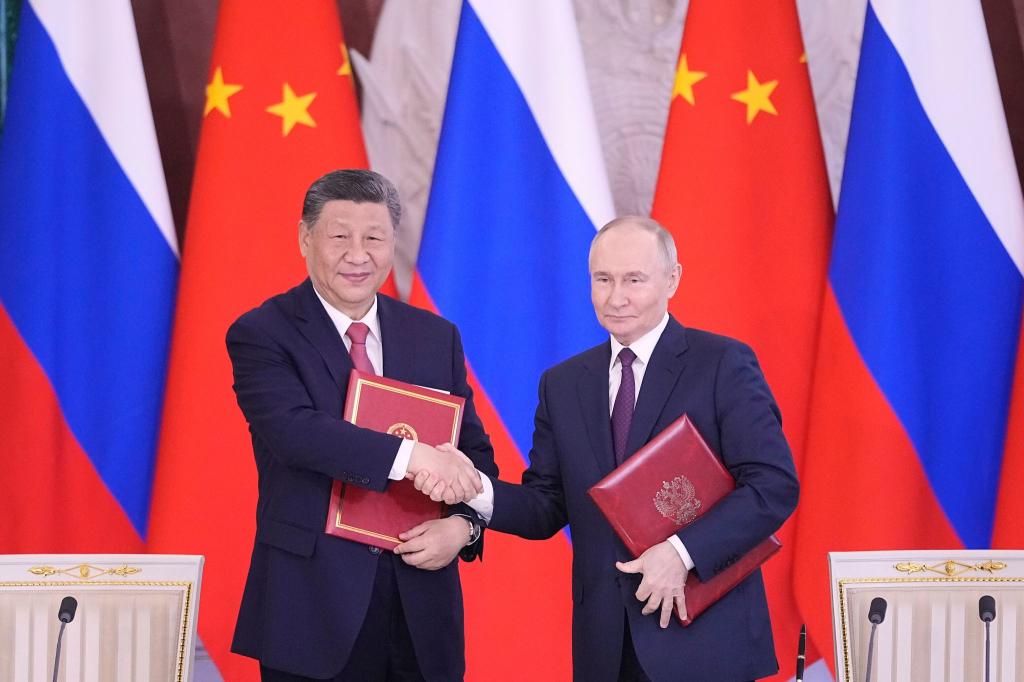 Putin und Xi bekräftigen Partnerschaft. - Foto: Pavel Bednyakov/AP/dpa