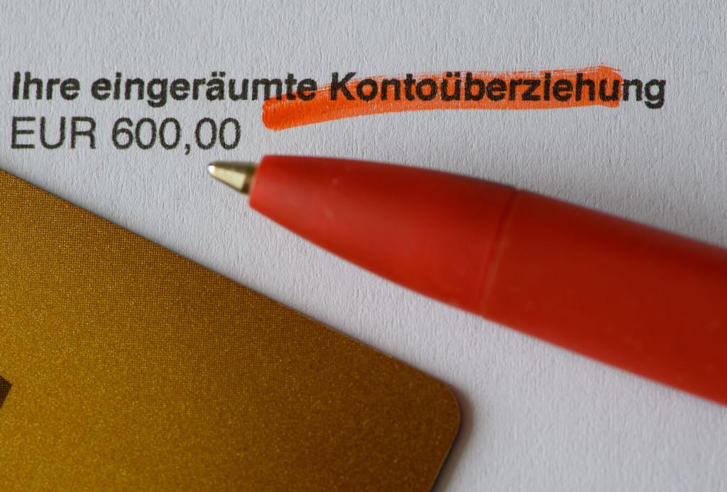 Die Frage einer Deckelung von Dispo-Zinsen wird in dem Entwurf nicht thematisiert. (Symbolbild) - Foto: Robert Michael/dpa-Zentralbild/dpa