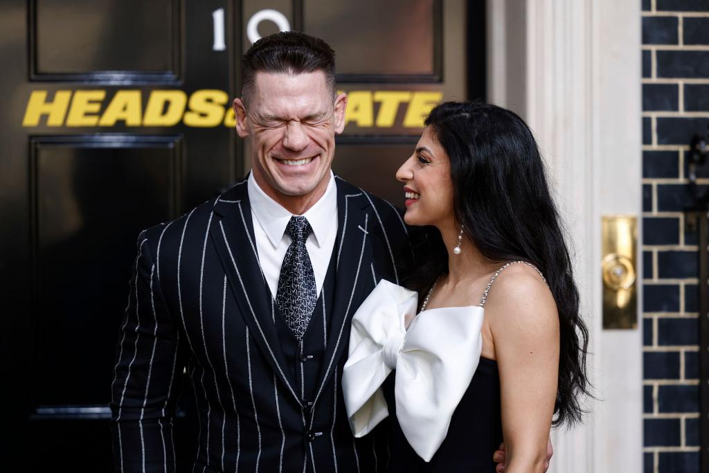In dem Film «Heads Of State» spielt John Cena (hier mit seiner Frau Shay Shariatzadeh bei der Filmpremiere) den US-Präsidenten Will Derringer, der wider Willen zum Actionhelden wird. - Foto: Millie Turner/Invision/AP/dpa