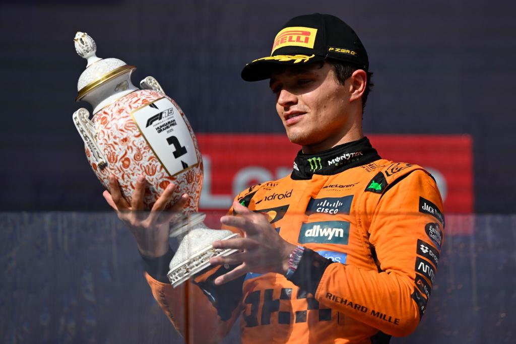 Lando Norris holte sich den Sieg in Ungarn mit einer gewagten Strategie. - Foto: Denes Erdos/AP/dpa
