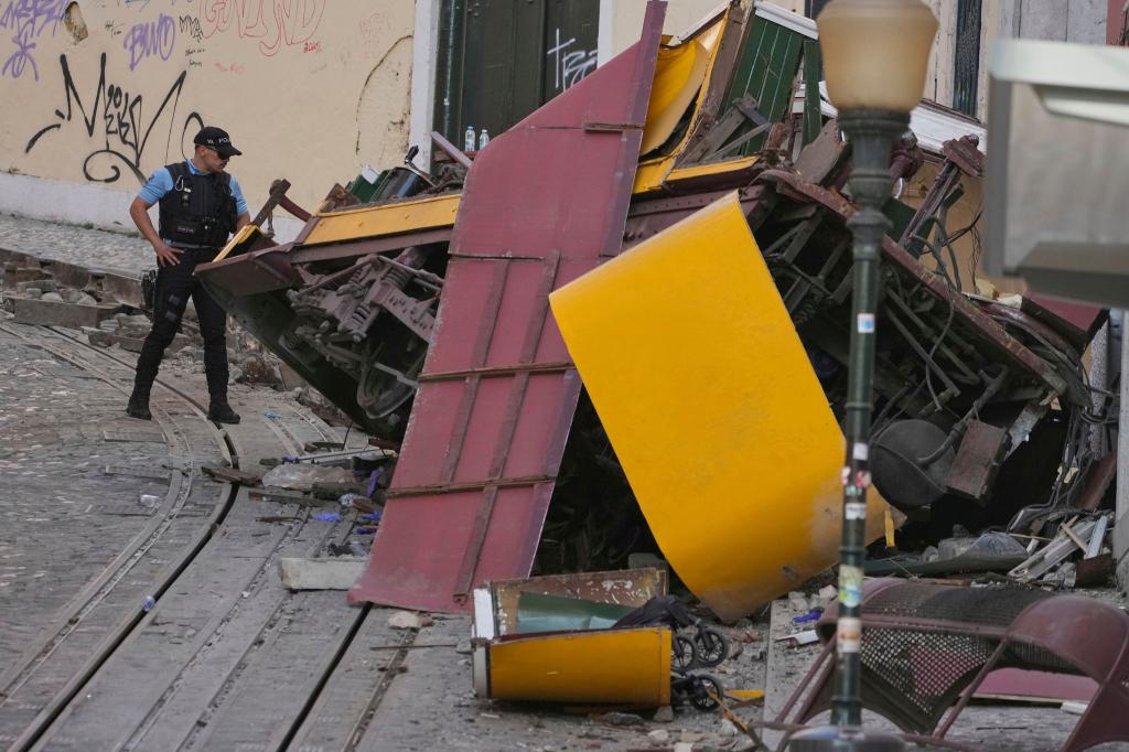 Bei dem Unglück in Lissabon kamen 16 Menschen ums Leben und 21 wurden verletzt. - Foto: Armando Franca/AP/dpa