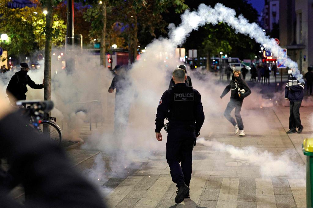 Tränengas in Paris – Frankreich vor landesweiten Protesten - Foto: Geoffroy Van Der Hasselt/AFP/dpa