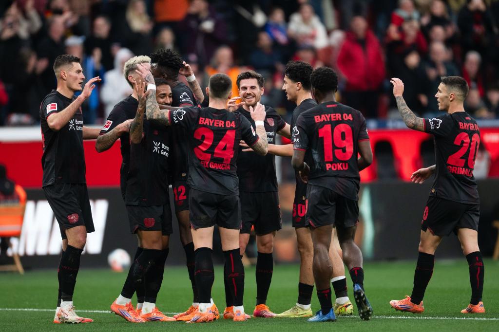 Bayer Leverkusen jubelt über den Treffer zum 2:0. - Foto: Marius Becker/dpa