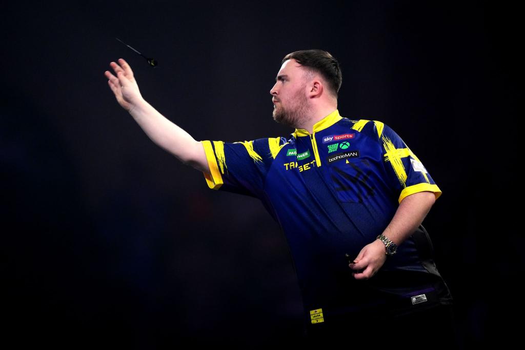 Luke Littler entschied das Duell mit Rob Cross für sich - Foto: John Walton/PA Wire/dpa