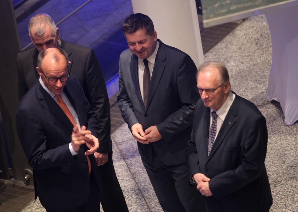 Merz sieht Grund für Zuversicht. - Foto: Sebastian Willnow/dpa