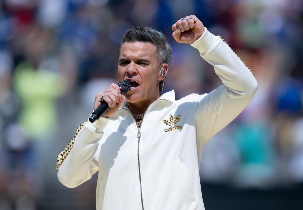 Robbie Williams überraschte seine Fans drei Wochen früher mit seinem neuen Album. (Archivbild) - Foto: Sven Hoppe/dpa